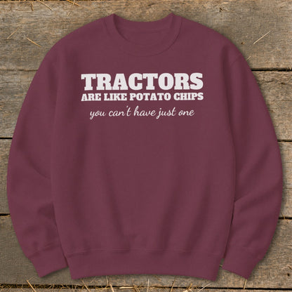 Maroon sweatshirt with white text: "TRACTORS ARE LIKE POTATO CHIPS you can't have just one"