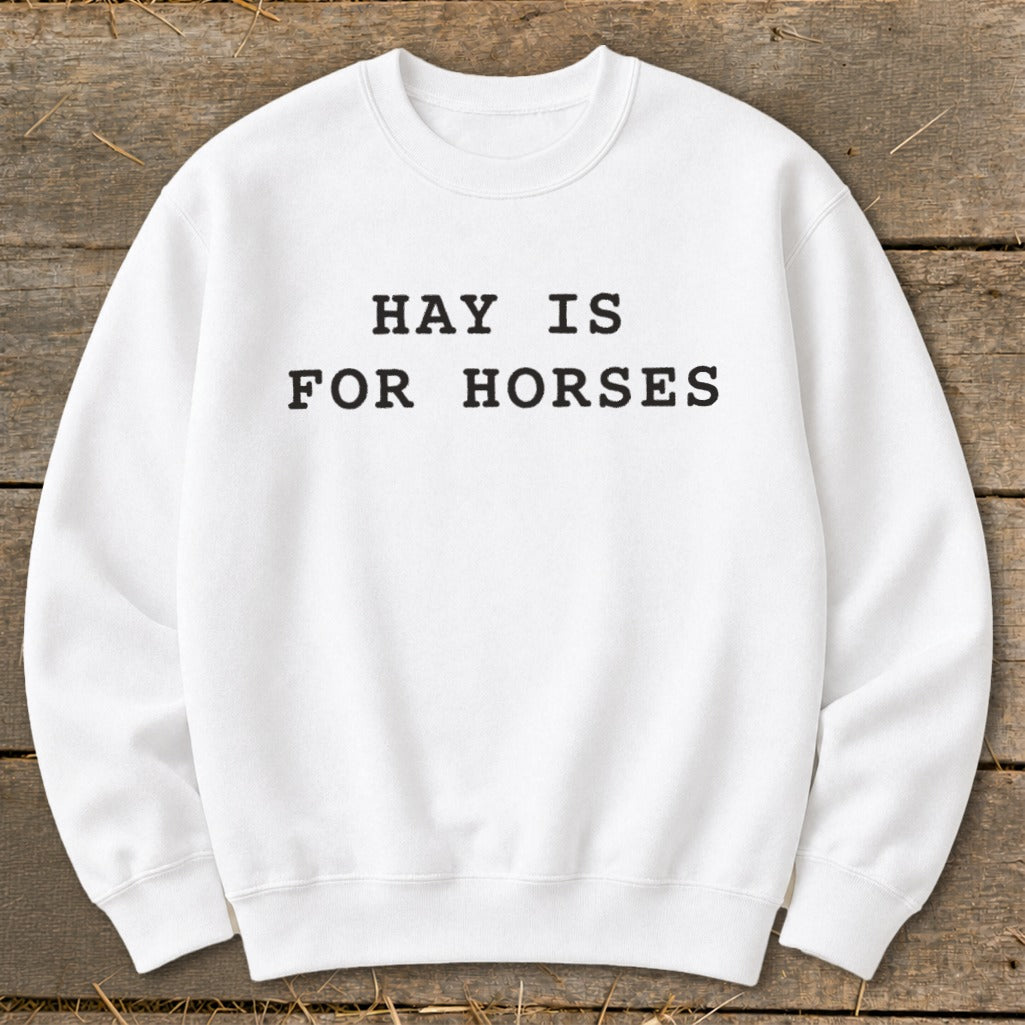 White sweatshirt with black text reading "HAY IS FOR HORSES".