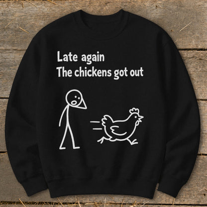 Black sweatshirt with white text and line drawing of a person and running chicken.