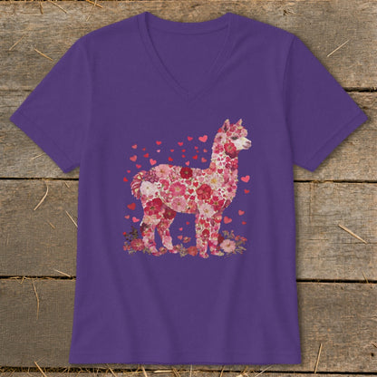 Purple t-shirt with a floral alpaca design and scattered hearts.