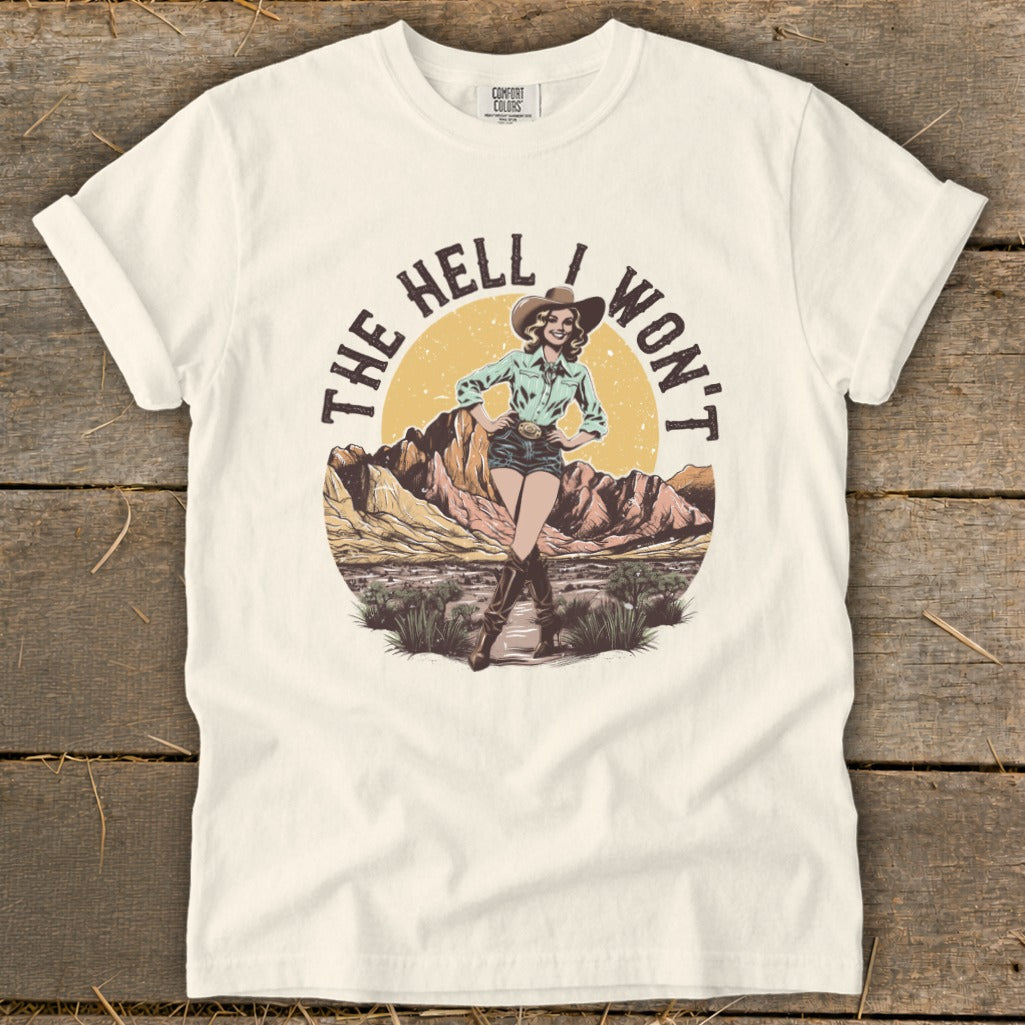 T-shirt graphic with cowboy woman and text "The Hell I Won't."