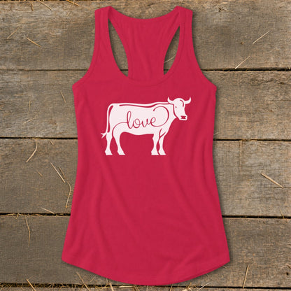 Pink tank top with white cow silhouette graphic and "love" text.