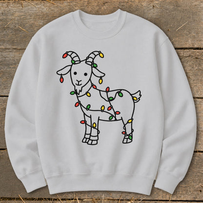 Light gray sweatshirt with a line drawing of a goat wrapped in colorful Christmas lights.