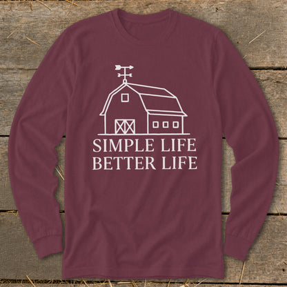 Maroon long sleeve shirt with white barn graphic and text "SIMPLE LIFE BETTER LIFE".