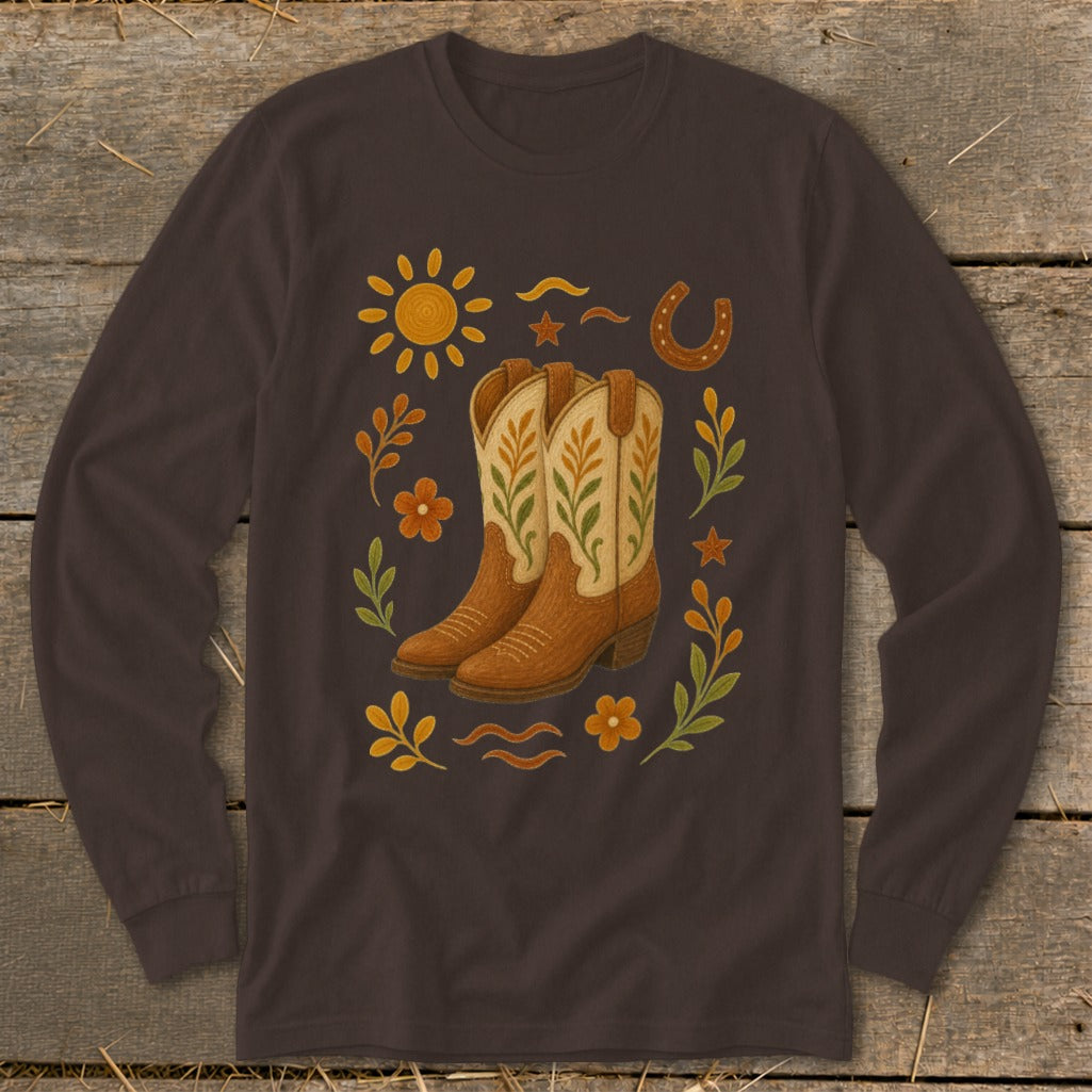 Brown long-sleeve shirt with cowboy boots, sun, horseshoe, and floral accents.
