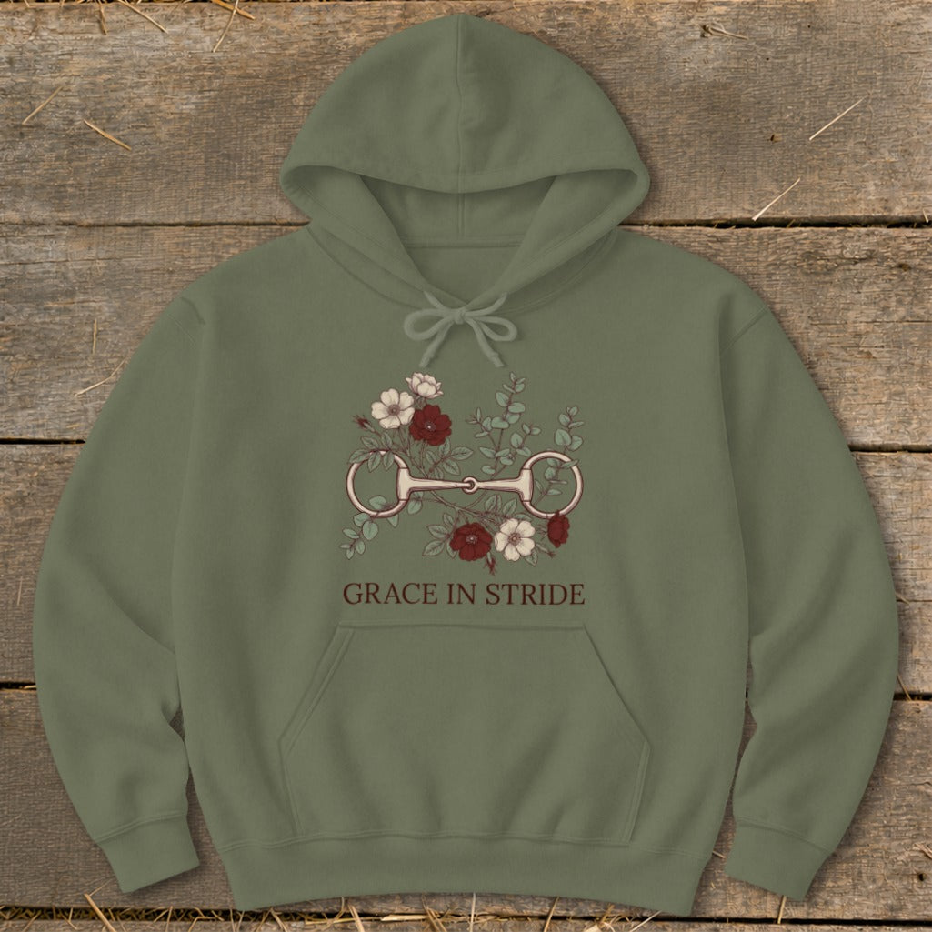 Olive green hoodie with horse bit and floral graphic, text "Grace in Stride".