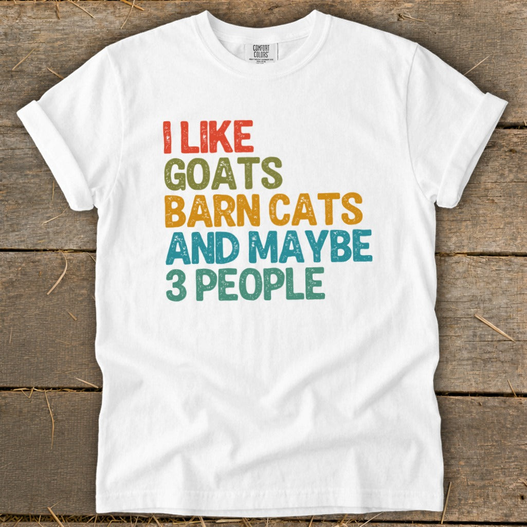White t-shirt with colorful text "I LIKE GOATS BARN CATS AND MAYBE 3 PEOPLE".