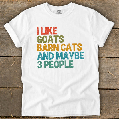 White t-shirt with colorful text "I LIKE GOATS BARN CATS AND MAYBE 3 PEOPLE".