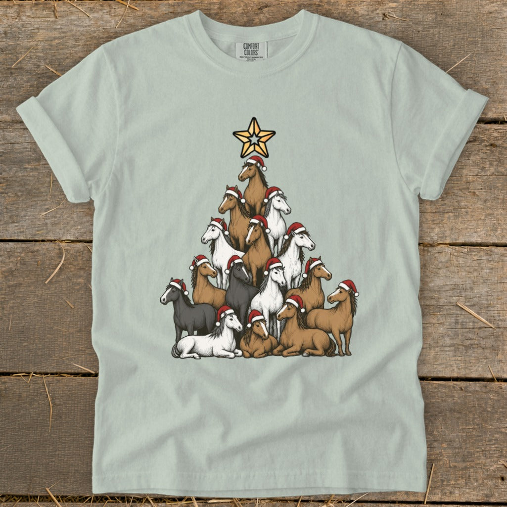 T-shirt with a Christmas tree made of horses wearing Santa hats and a star.
