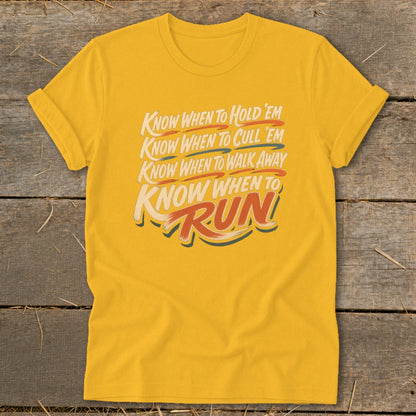 Yellow t-shirt with text "Know when to Hold 'Em, Know when to Cull 'Em, Know when to Walk Away, Know when to RUN."