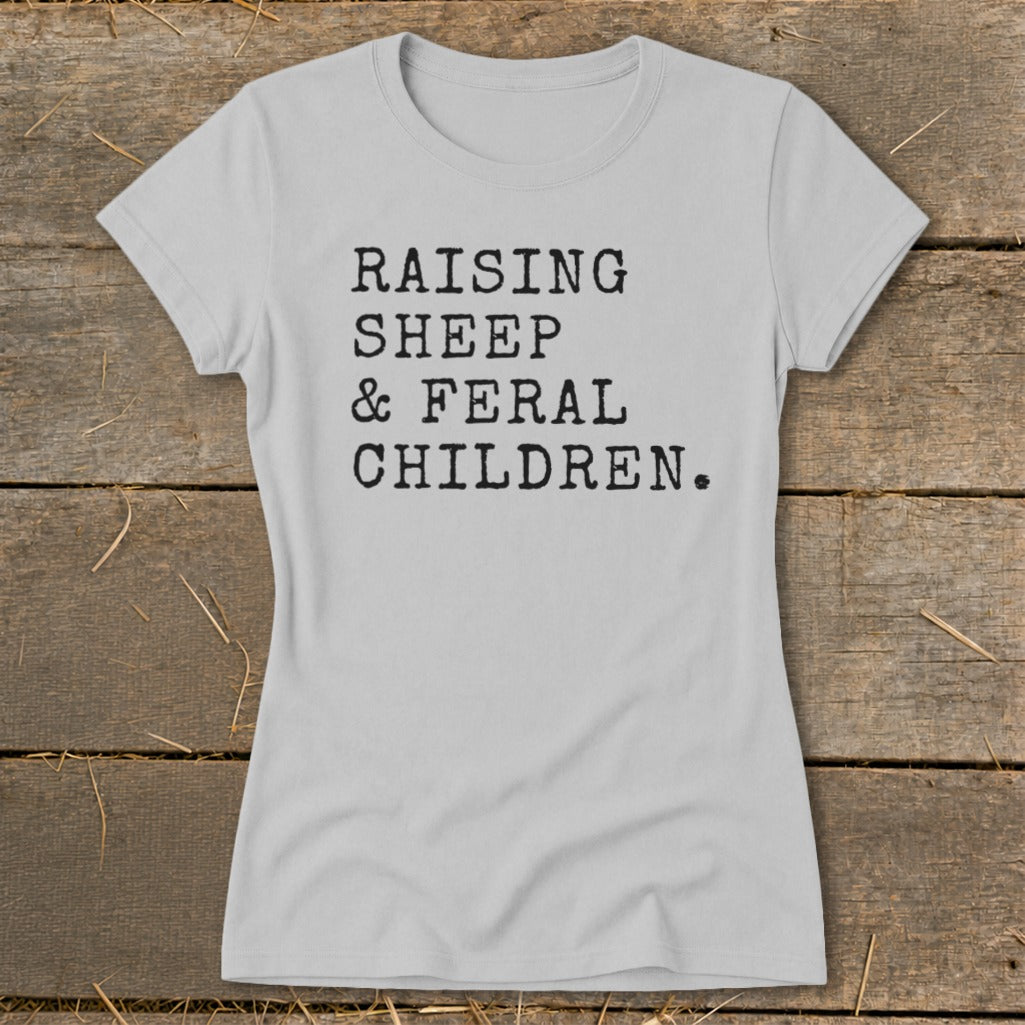 Gray t-shirt with black text that reads "RAISING SHEEP & FERAL CHILDREN."