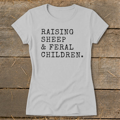 Gray t-shirt with black text that reads "RAISING SHEEP & FERAL CHILDREN."