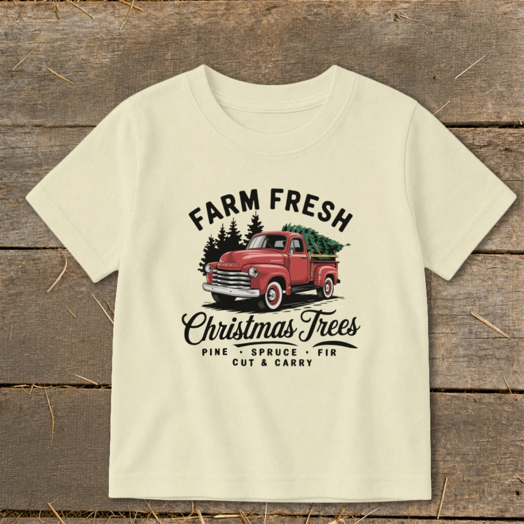 Cream t-shirt with "Farm Fresh Christmas Trees" graphic featuring a red truck.