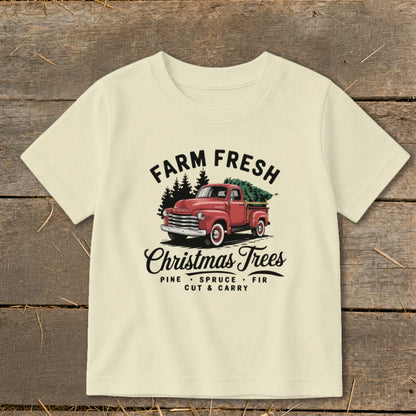 Cream t-shirt with "Farm Fresh Christmas Trees" graphic featuring a red truck.