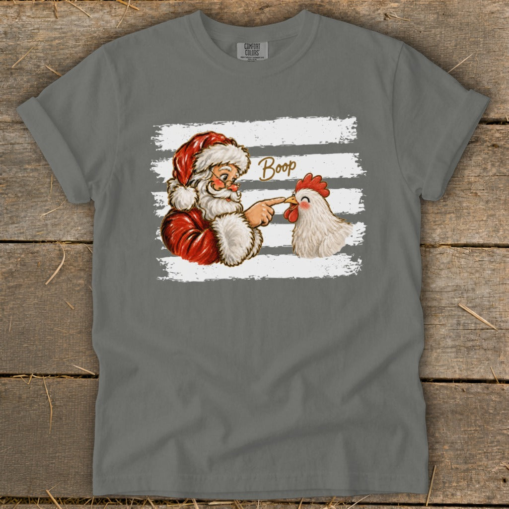 Santa playfully boops a chicken with his finger, the word "Boop" above them.