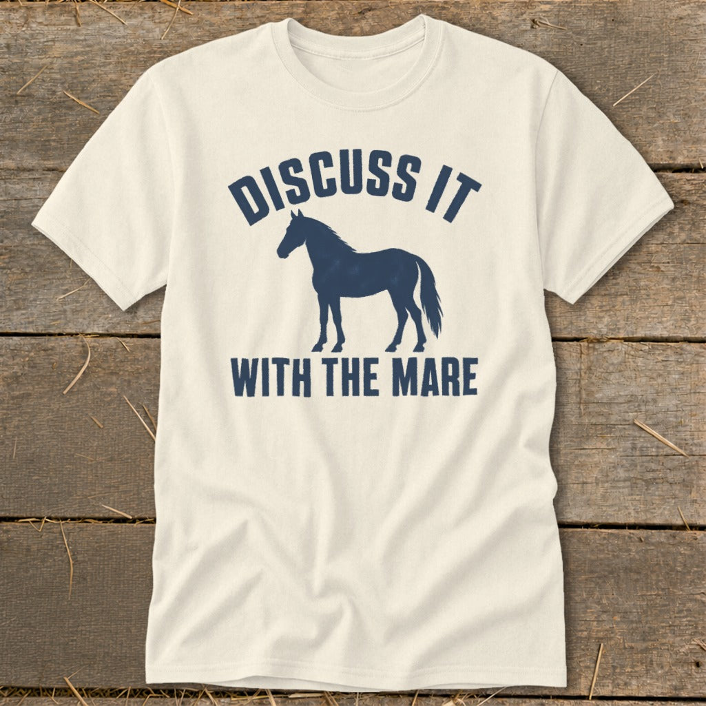 Cream t-shirt with navy blue text "DISCUSS IT WITH THE MARE" and horse silhouette.