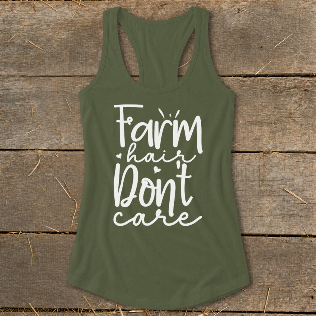 Olive green tank top with white text "Farm hair don't care".