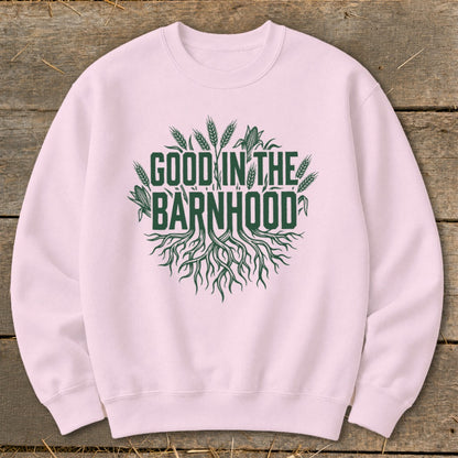 Pink sweatshirt with green "GOOD IN THE BARNHHOOD" text and root graphic.
