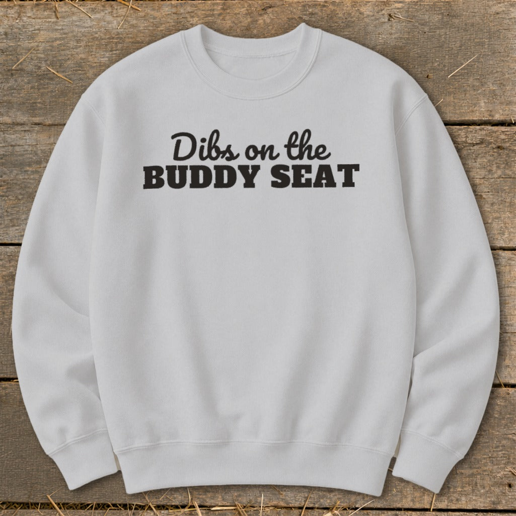 White sweatshirt with "Dibs on the BUDDY SEAT" graphic text.