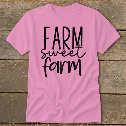 Pink t-shirt with black text reading "FARM sweet farm"