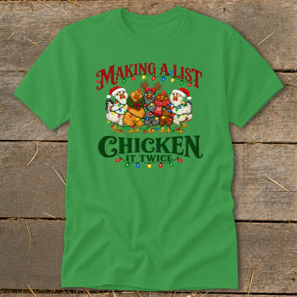 Green t-shirt with chickens in Santa hats and Christmas lights, reading "Making A List, Chicken It Twice".