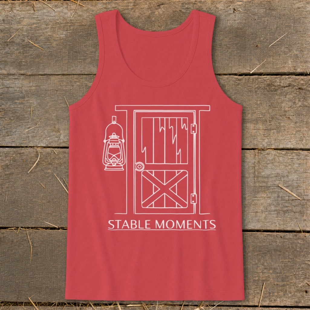 Red tank top with white line art of a barn door and hanging lantern, "Stable Moments" text.