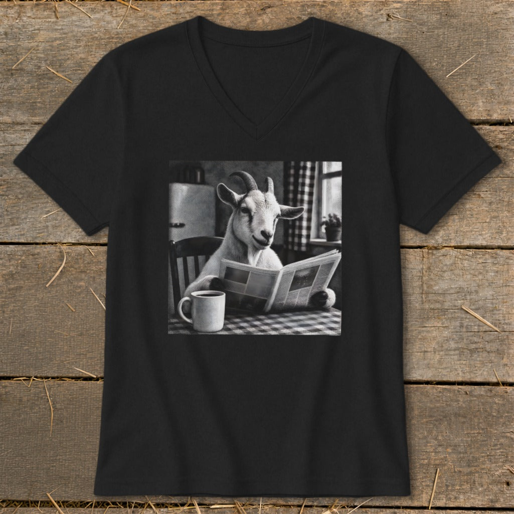 A black V-neck t-shirt featuring a black and white graphic of a goat reading a newspaper.