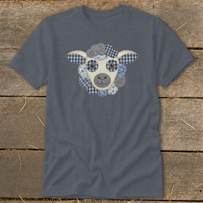 Blue t-shirt with a sheep face appliqué made of various patterned fabrics.