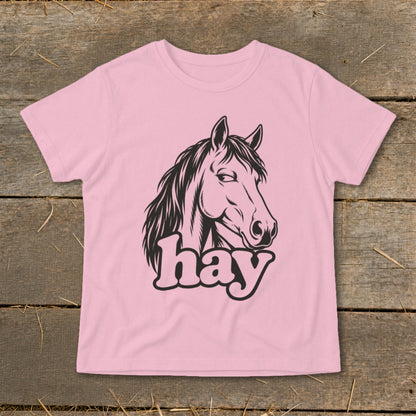 Pink t-shirt with a black horse head and the word "hay".