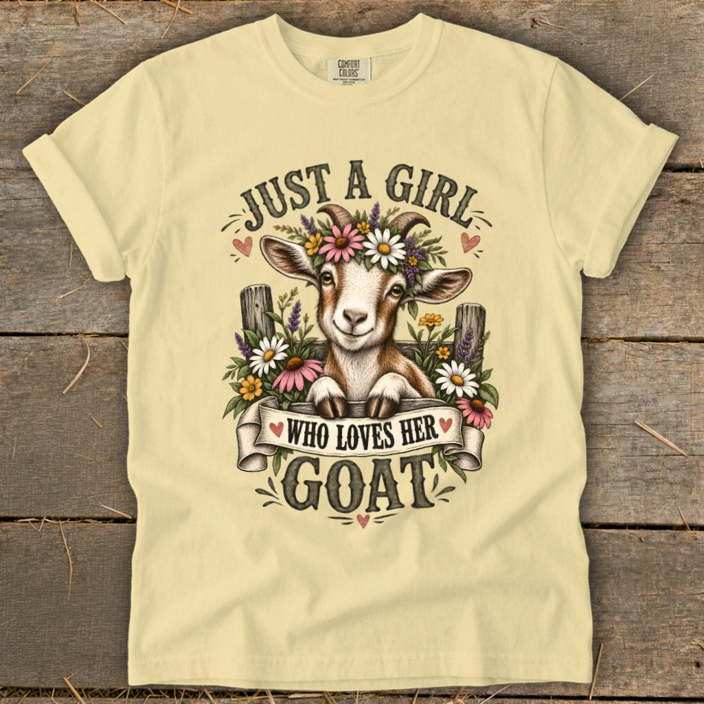 T-shirt with a goat graphic and text "Just a girl who loves her goat".