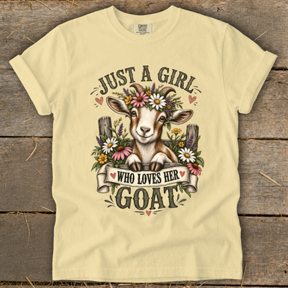 T-shirt with a goat graphic and text "Just a girl who loves her goat".