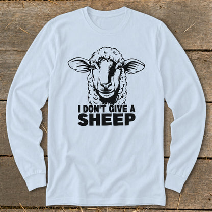 Long sleeve white shirt with black graphic of sheep and text "I DON'T GIVE A SHEEP".