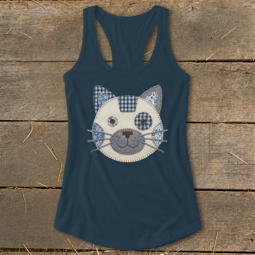 Tank top with a blue fabric applique of a patchwork cat face.