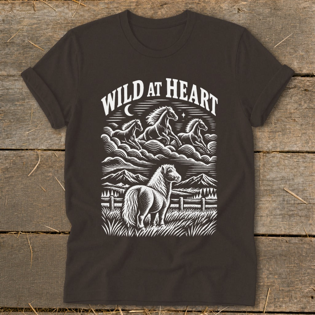 Dark t-shirt with "Wild at Heart" graphic of horses running and standing.
