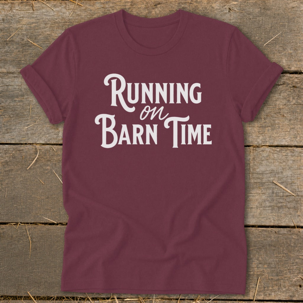 Maroon t-shirt with white text reading "Running on Barn Time."
