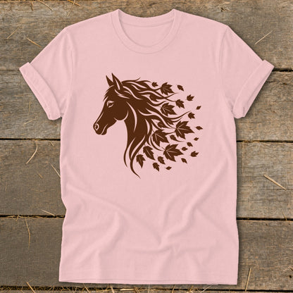 Brown horse head silhouette with flowing mane made of leaves on a pink t-shirt.