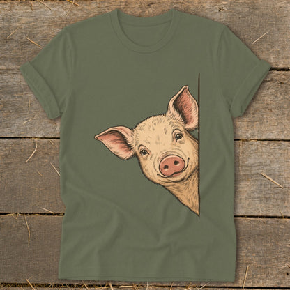 Olive green t-shirt featuring a drawing of a peeking pig.