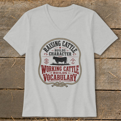 Light gray v-neck t-shirt with a circular graphic about raising cattle.