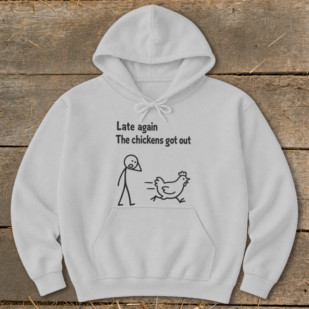 White hoodie with "Late again The chickens got out" text and stick figure graphic.