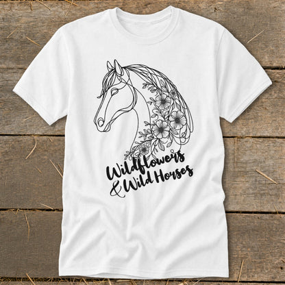 White t-shirt with black line art of a horse's head and wildflowers, text reads "Wildflowers & Wild Horses".