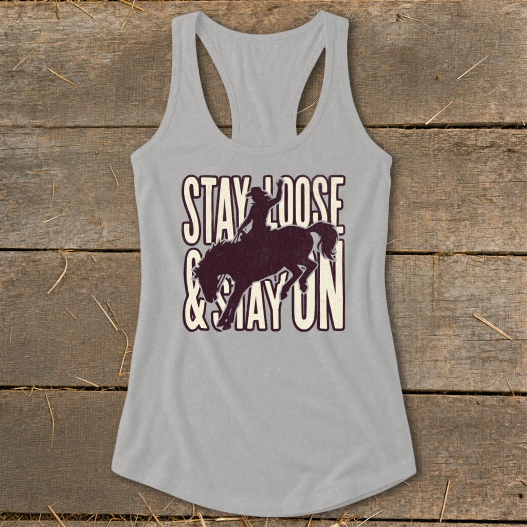 Gray tank top with "Stay Loose & Stay On" and bucking bronco graphic.