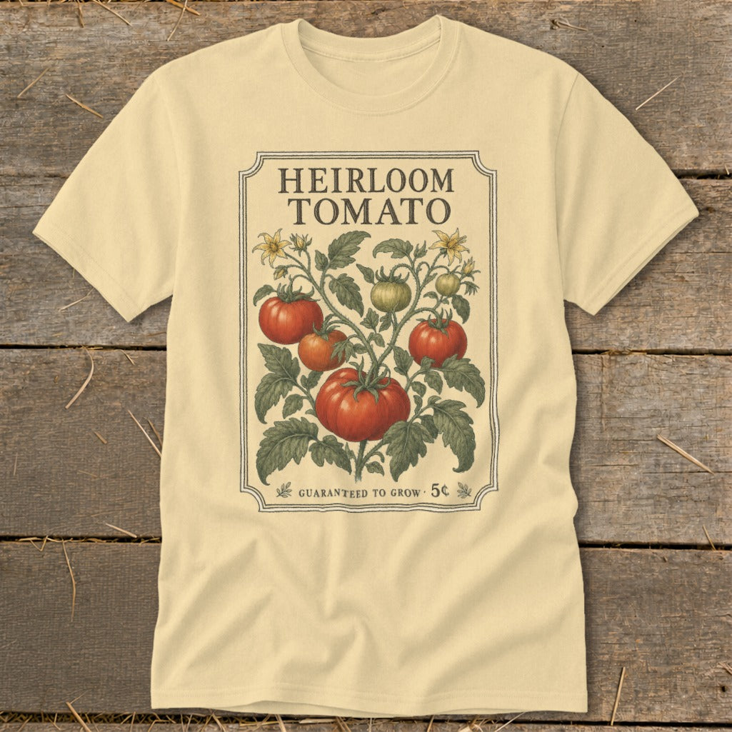 Light yellow t-shirt with "Heirloom Tomato" and vintage tomato vine illustration.
