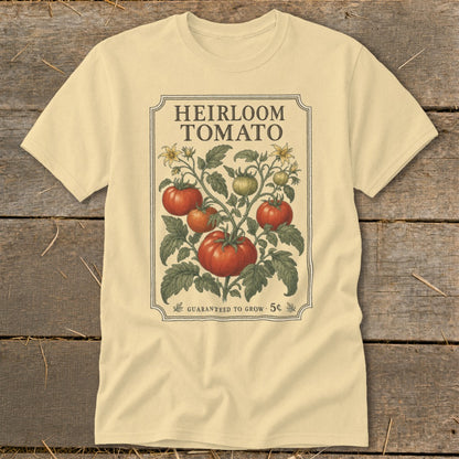 Light yellow t-shirt with "Heirloom Tomato" and vintage tomato vine illustration.
