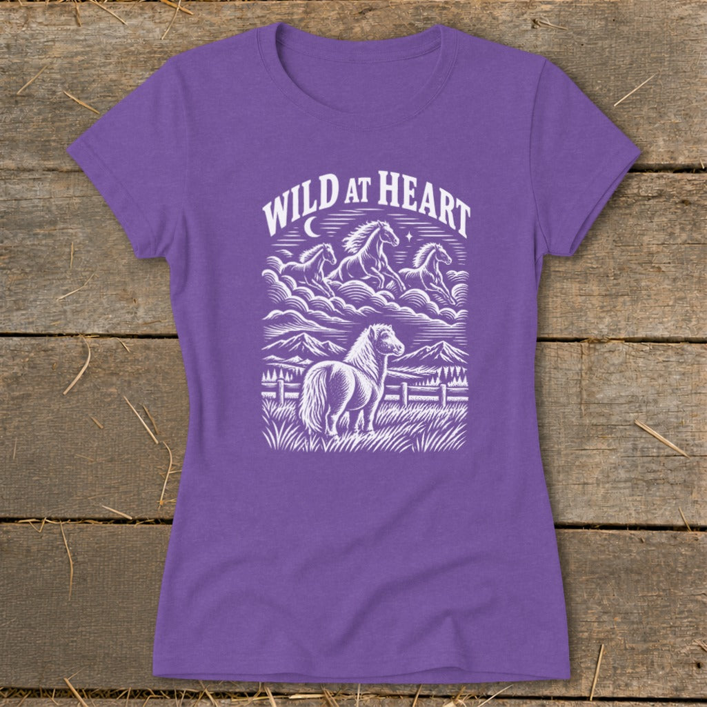 Purple t-shirt with "Wild at Heart" text and horse graphic.
