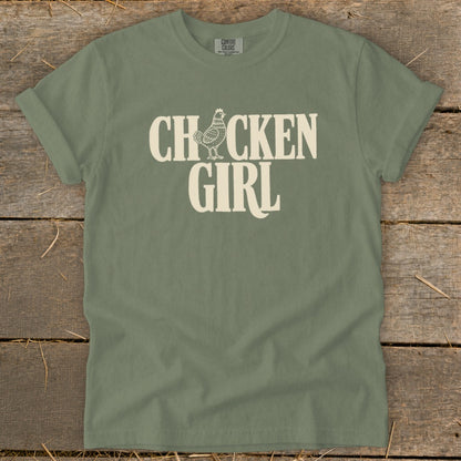 Olive t-shirt with "CHXXCKEN GIRL" text and chicken graphic.