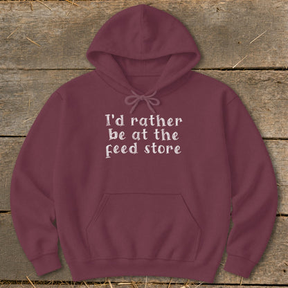 Maroon hoodie with white text that reads "I'd rather be at the feed store".