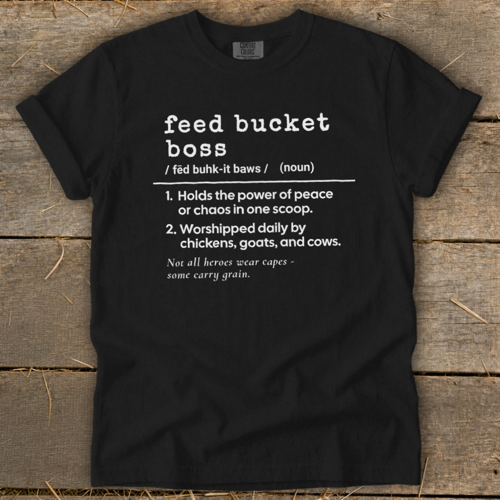 Black t-shirt with white text defining "feed bucket boss" and humorous farming sayings.