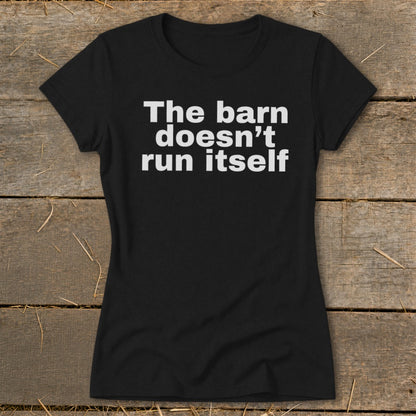 Black t-shirt with white text "The barn doesn't run itself."