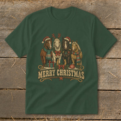 Four horses wearing Christmas hats and scarves stand with gifts and a horseshoe.