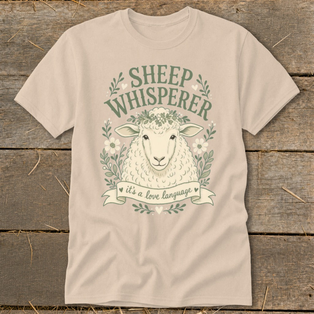 Tan t-shirt with sheep illustration and text "SHEEP WHISPERER it's a love language".